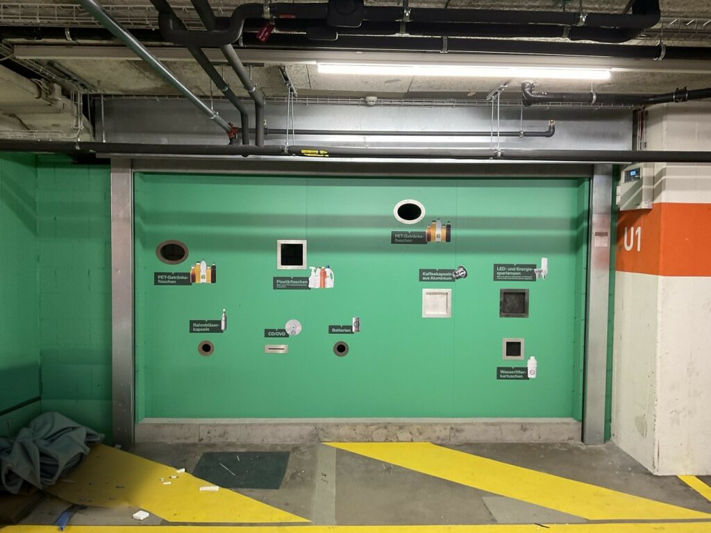 a green garage door with white signs